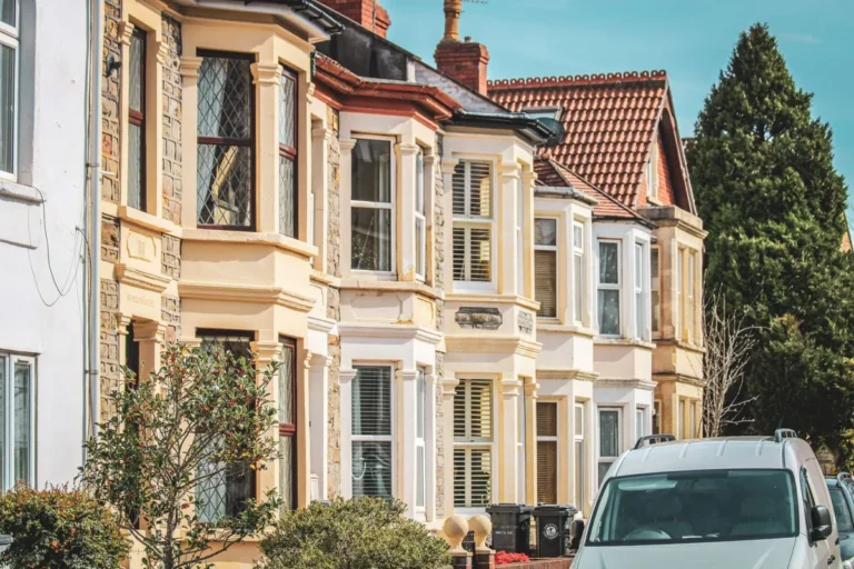 Elegant row of period townhouses with tall sash windows
