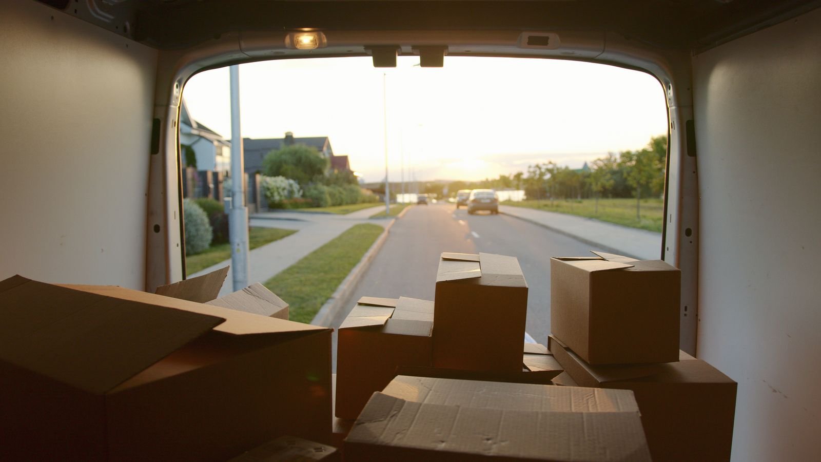 Cardboard boxes loaded inside a van